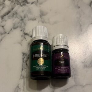 Young Living Sealed Dragon Time and Sara new never opened